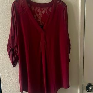 Red blouse. Lace shoulders. 3/4 sleeves with button detail.